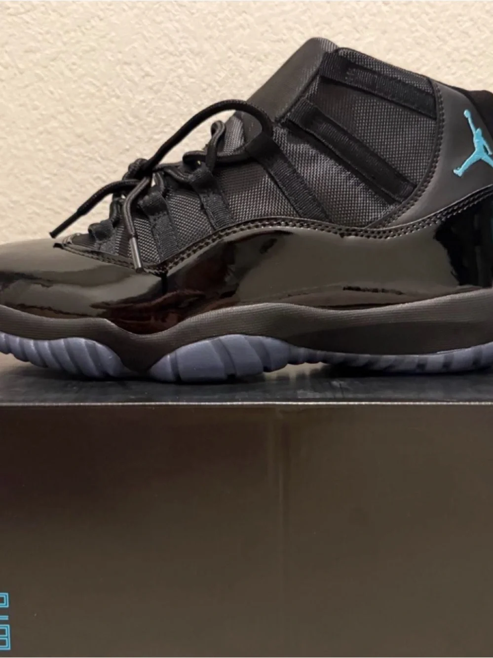 Jordan Men’s Black Sneakers with Blue Jumpman Accent